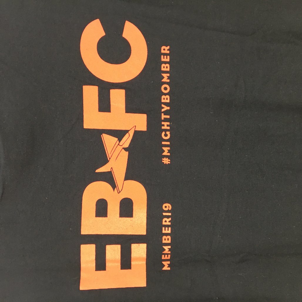 AFL Essendon Bombers #MightyBomber Black Text Graphic Tee Youth Sz Medium NEW