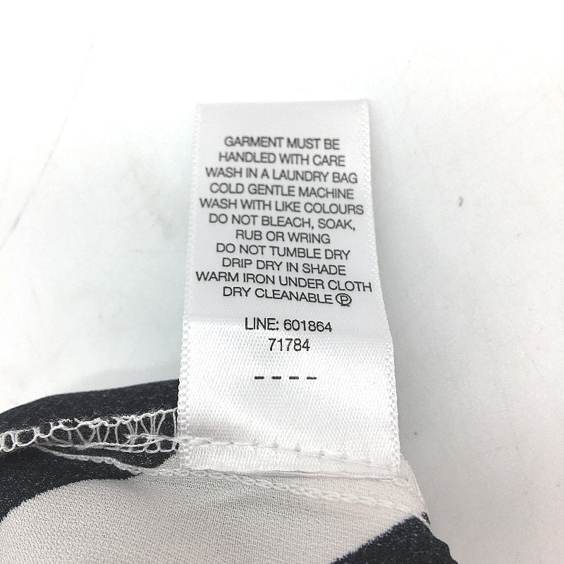 Dotti Emily In Paris Black & White High Neck No Sleeve Full Leg Jumpsuit NEW