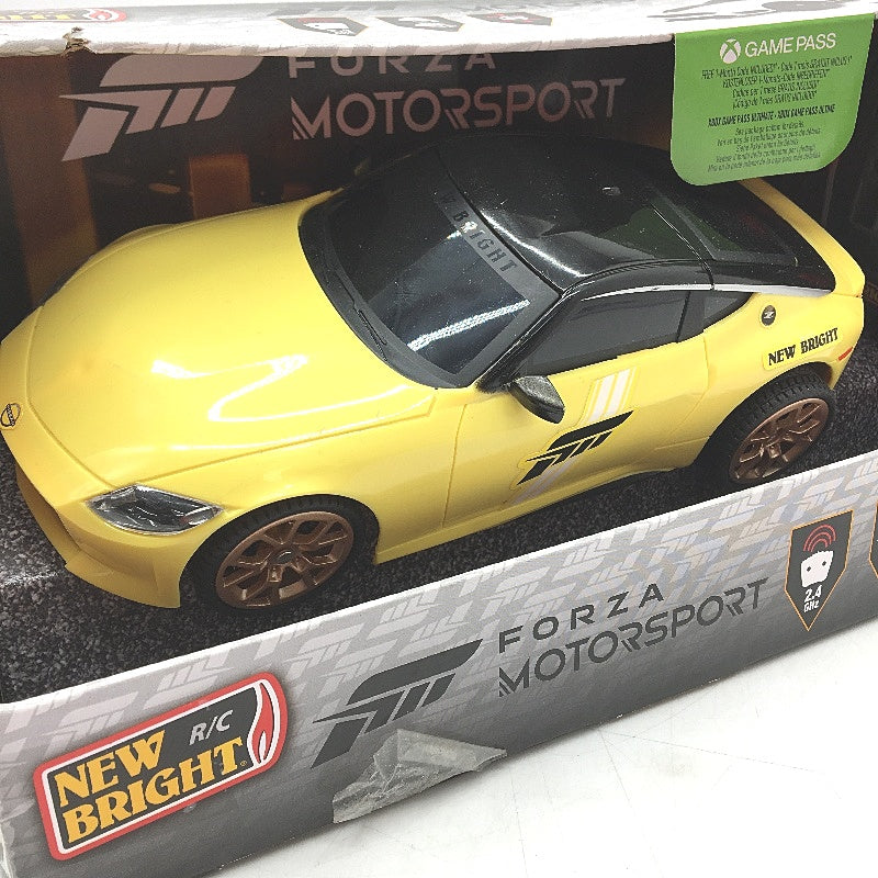 New Bright RC Nissan Z Radio Control Car Remote Controller Yellow Plastic NEW