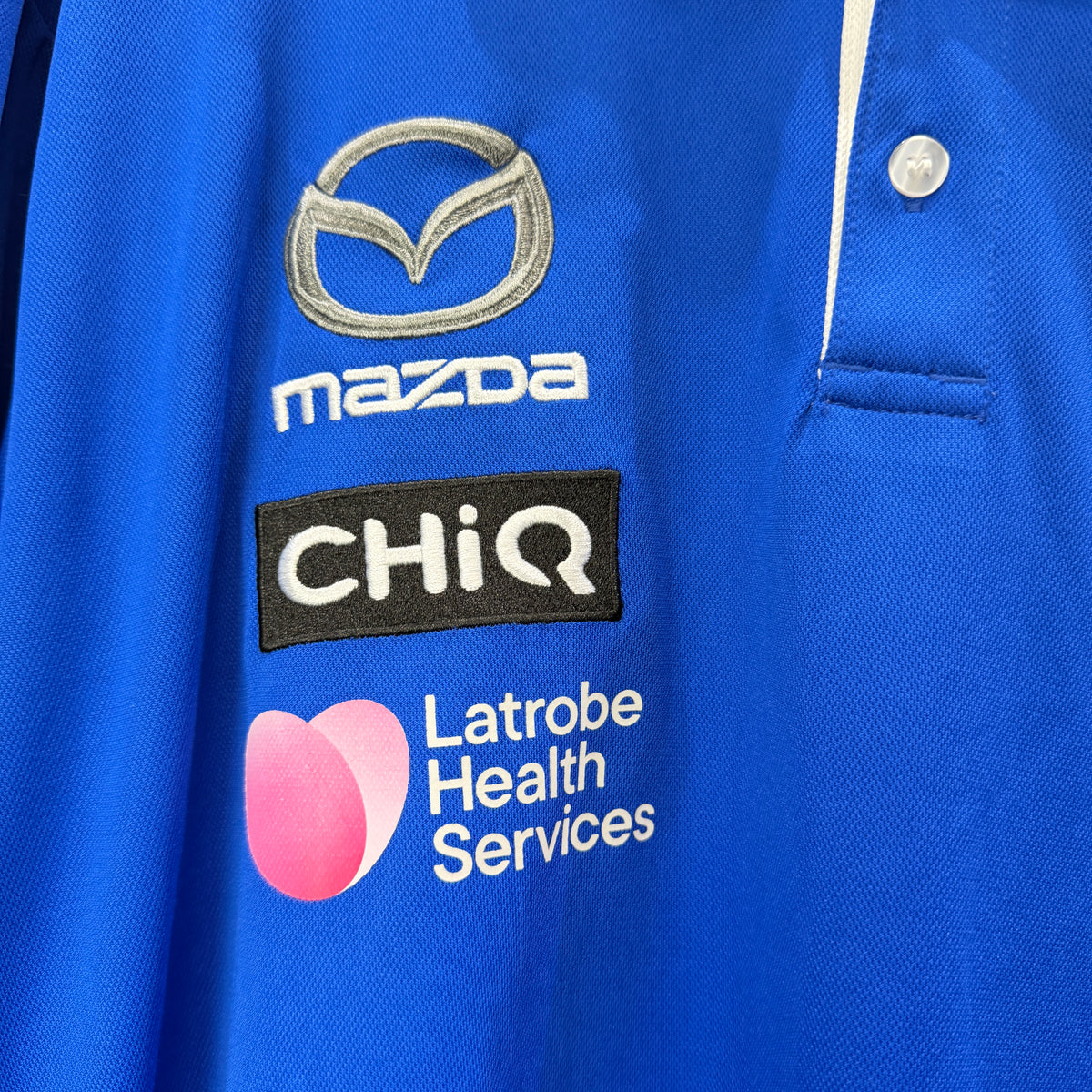 AFL North Melbourne Kangaroos Polo T-Shirt Size Large– Vinnies Recent Donation