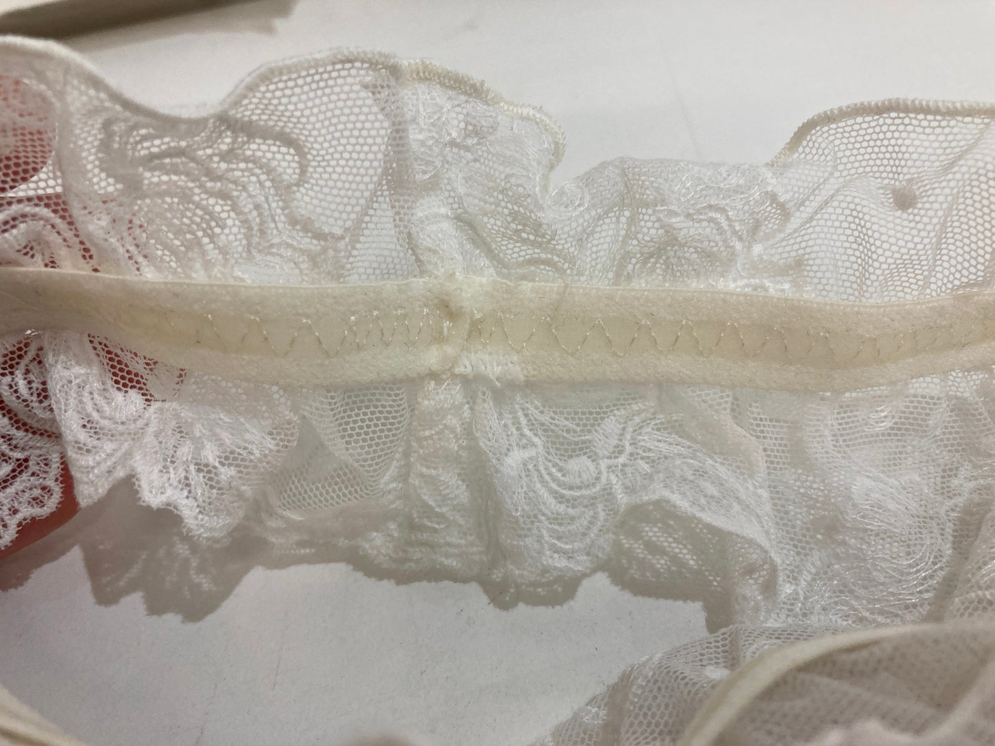 Ex-display pretty leg garter with navy and white floral design Size S